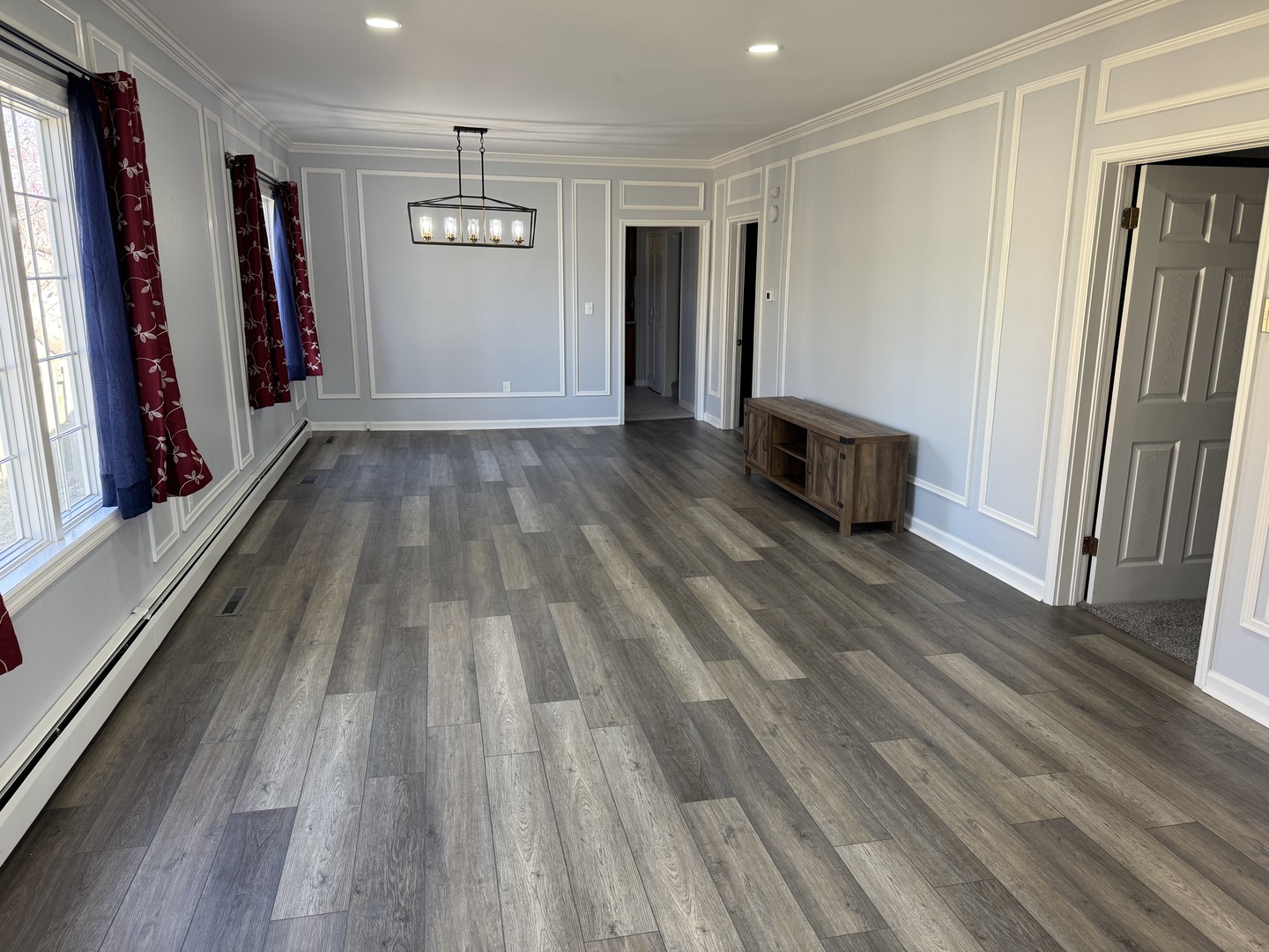 403 Mitchell Street Benton, IL 62812 - Photo 10 of 44 a view of empty room with wooden floor and fan