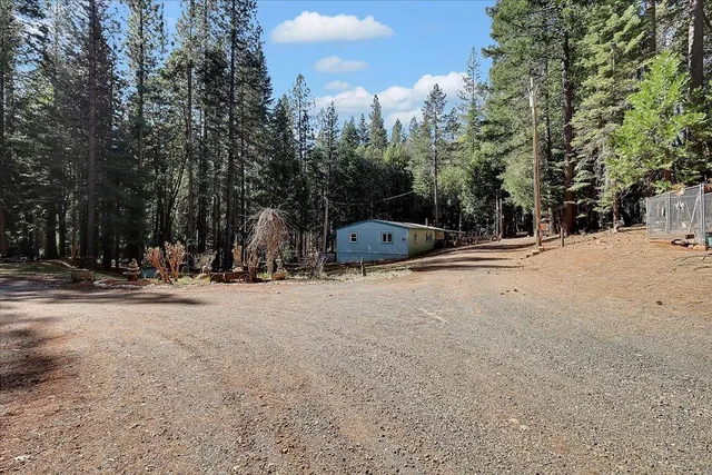 a view of a street with a building