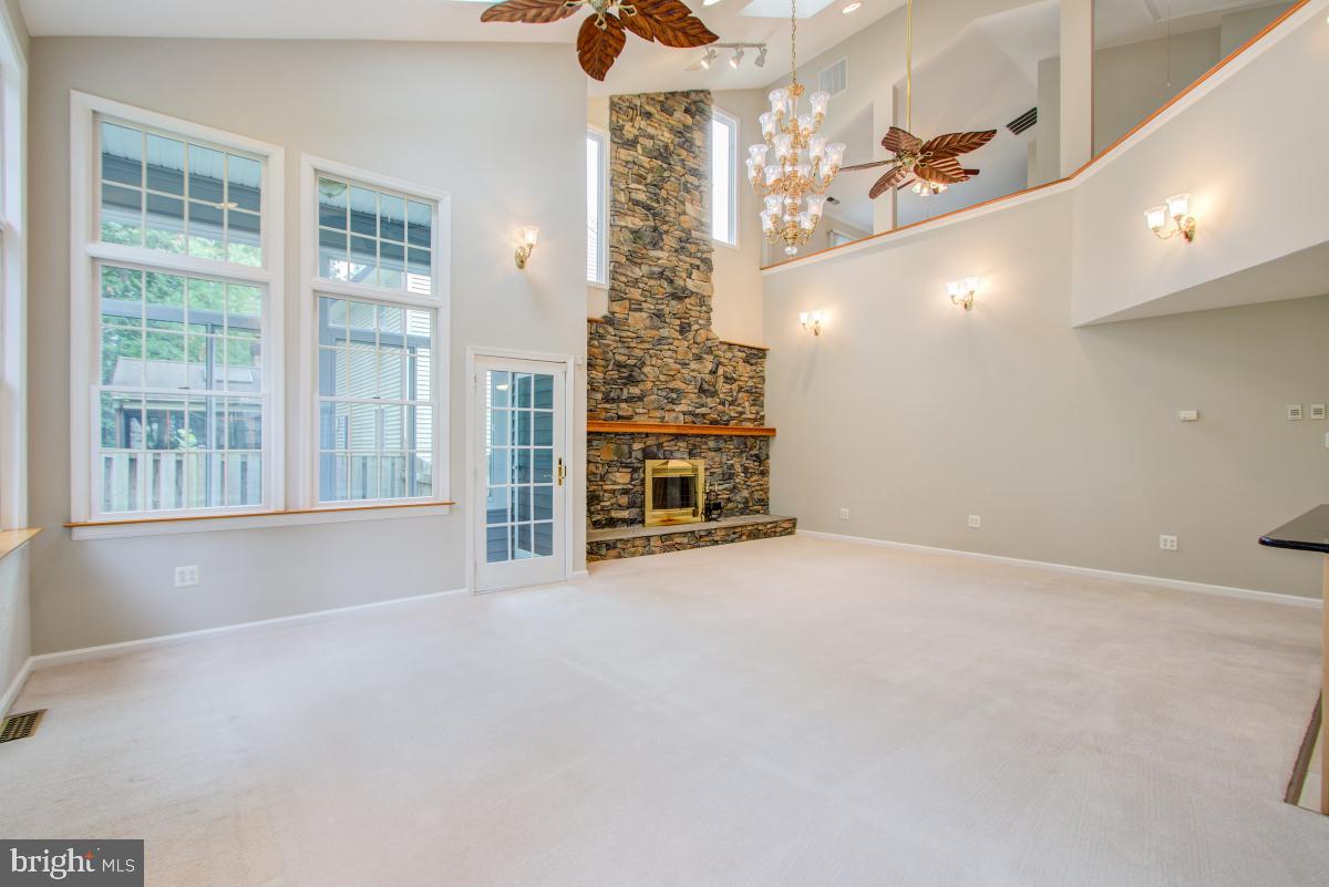 109 Summit Hall Road Gaithersburg, MD 20877 - Photo 12 of 57 Two story fireplace