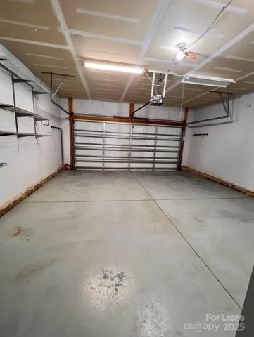 a view of an empty room with stairs