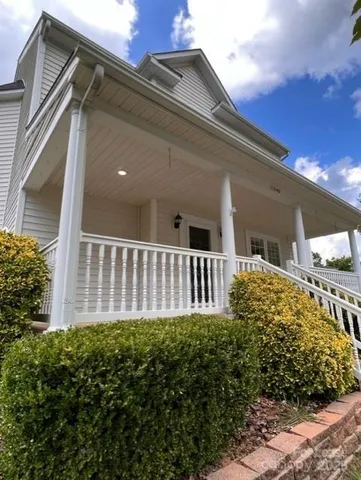 a backyard of a house with a garden