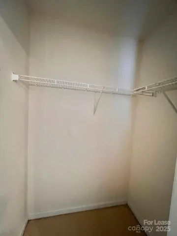 a view of small space with racks on the wall