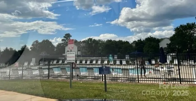 a balcony with lots of green space and garden