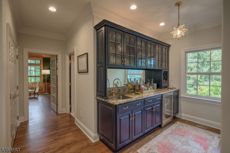 51 Post Kennel Road Bernardsville, NJ 07924 - Photo 17 of 43 a room with furniture large window and wooden floor