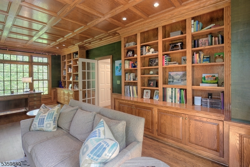51 Post Kennel Road Bernardsville, NJ 07924 - Photo 19 of 43 a living room with furniture and a book shelf