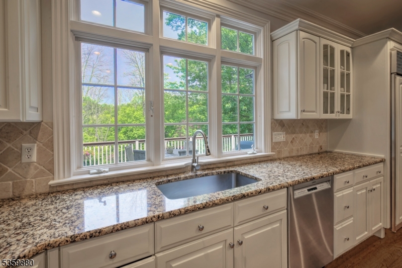 51 Post Kennel Road Bernardsville, NJ 07924 - Photo 10 of 43 a kitchen with granite countertop a sink and a window