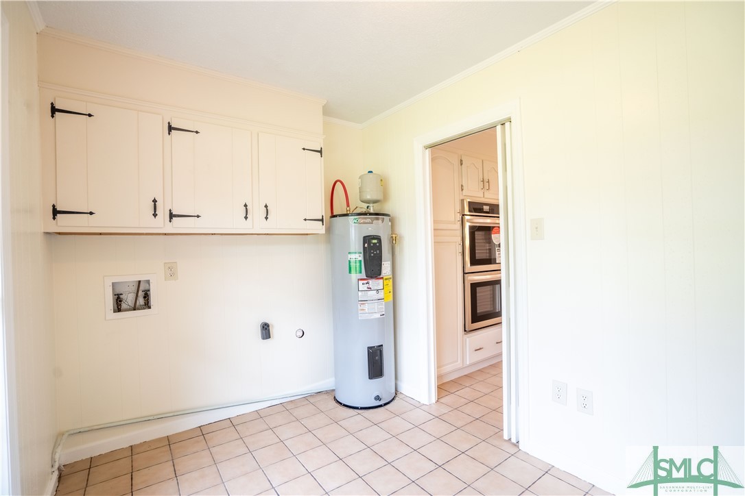 420 Gleason Avenue Pooler, GA 31322 - Photo 12 of 33 LARGE LAUNDRY/UTILITY ROOM WITH PLENTY OF STORAGE