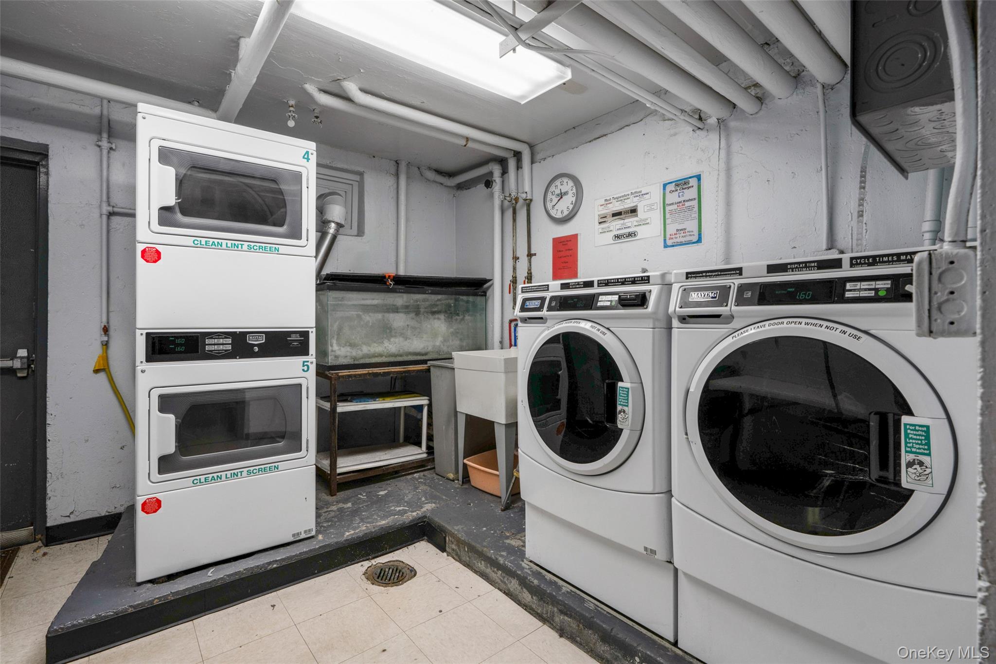 179 Drake Avenue, Unit 2J New Rochelle, NY 10805 - Photo 11 of 16 Communal laundry room featuring estacked washer and dryer