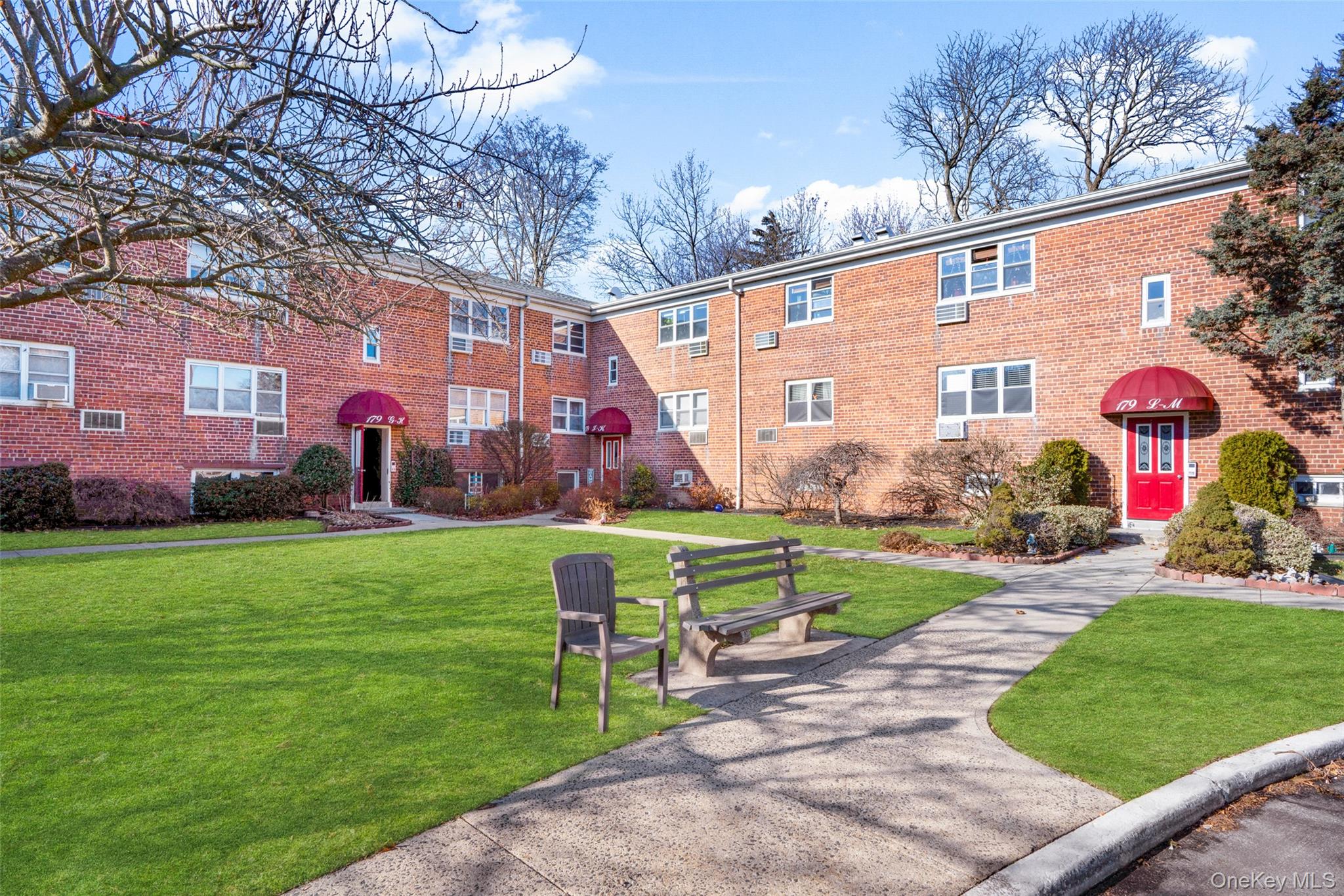 179 Drake Avenue, Unit 2J New Rochelle, NY 10805 - Photo 14 of 16 View of community featuring a yard