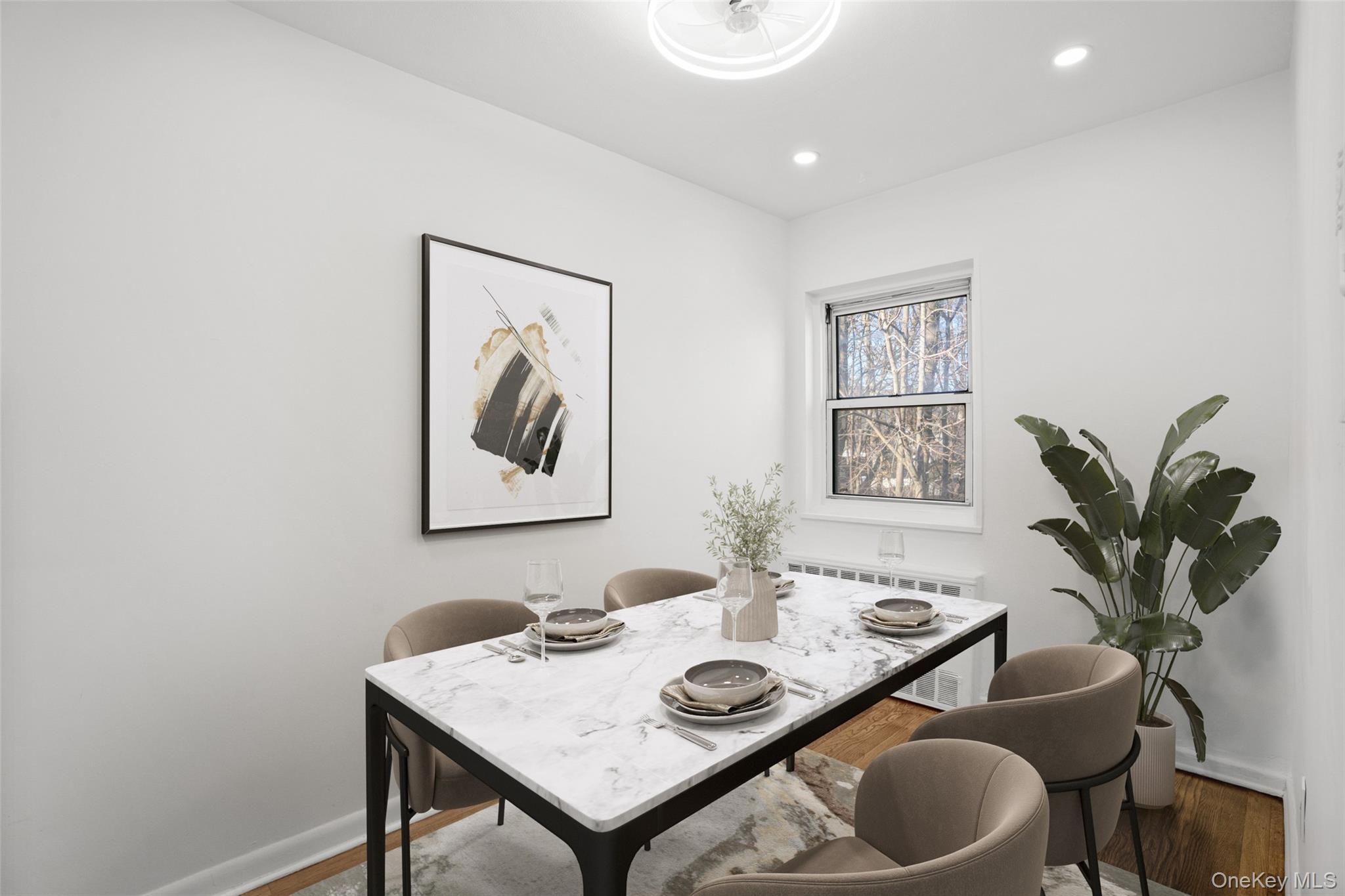 179 Drake Avenue, Unit 2J New Rochelle, NY 10805 - Photo 6 of 16 Dining space featuring wood finished floors and recessed lighting