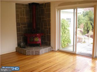 158 Mercer Mill Road Landenberg, PA 19350 - Photo 4 of 10 a view of empty room with wooden floor and fan