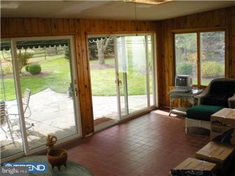 158 Mercer Mill Road Landenberg, PA 19350 - Photo 6 of 10 a living room with hardwood floor and a floor to ceiling window