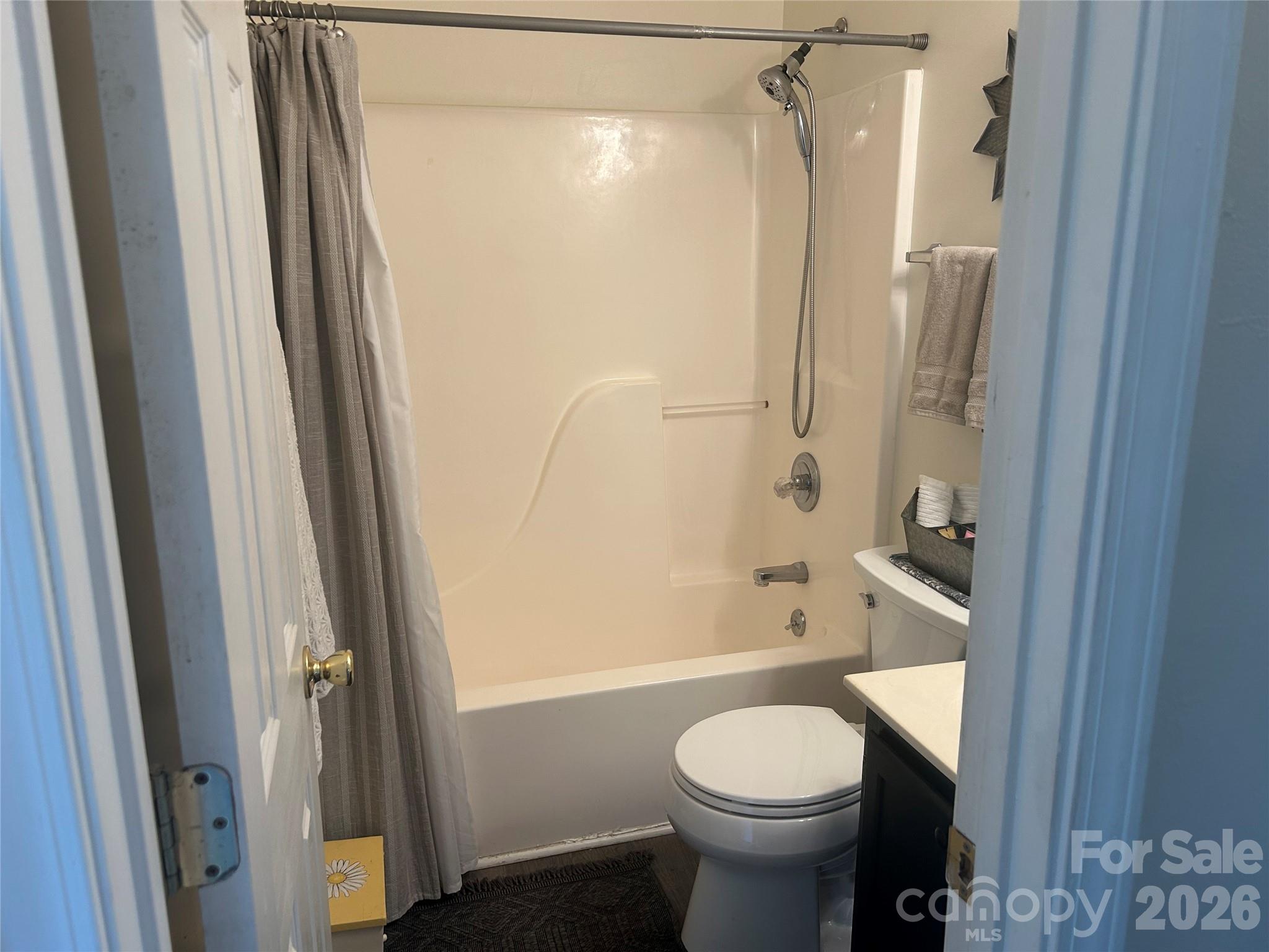 110 Shenandoah Loop Troutman, NC 28166 - Photo 17 of 24 a bathroom with a sink toilet and shower