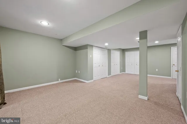 a view of a house with wooden walls