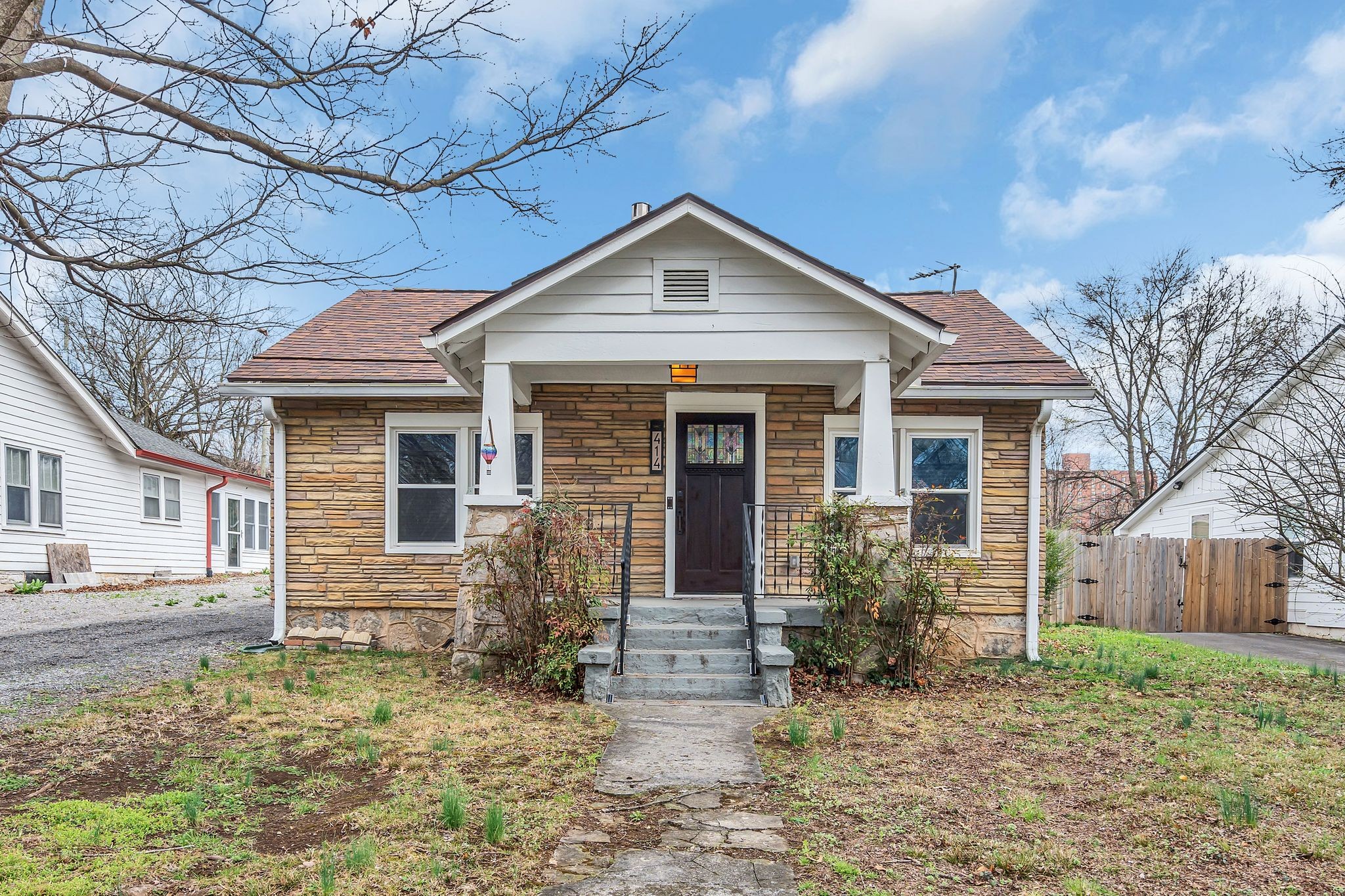 414 Elgin Street Nashville, TN 37211 - Photo 1 of 30 a front view of a house with garden