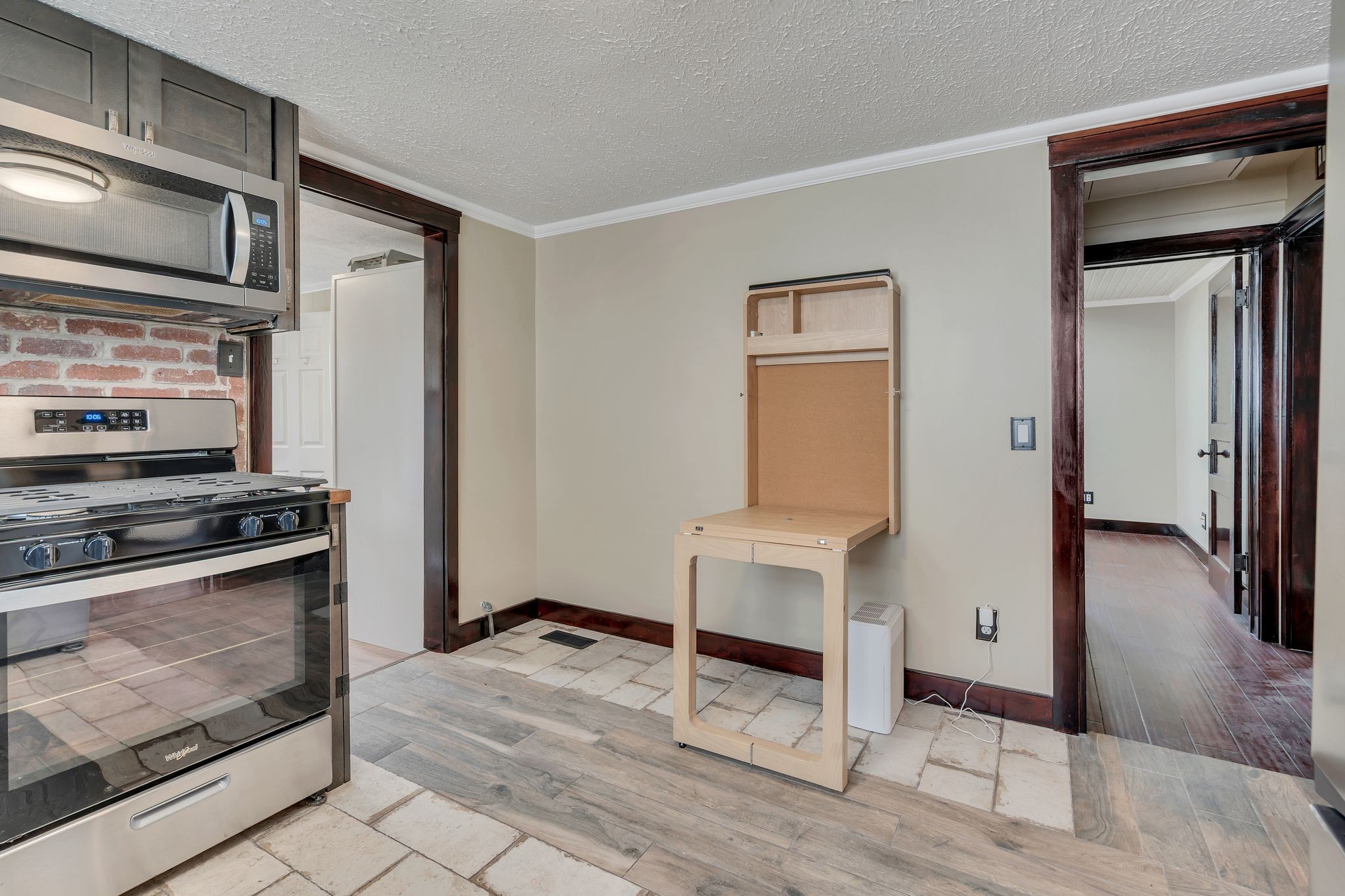 414 Elgin Street Nashville, TN 37211 - Photo 16 of 30 a kitchen with stainless steel appliances granite countertop a refrigerator and a stove top oven