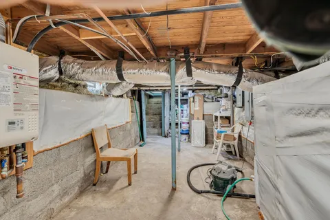 a view of a patio with table and chairs with wooden floor