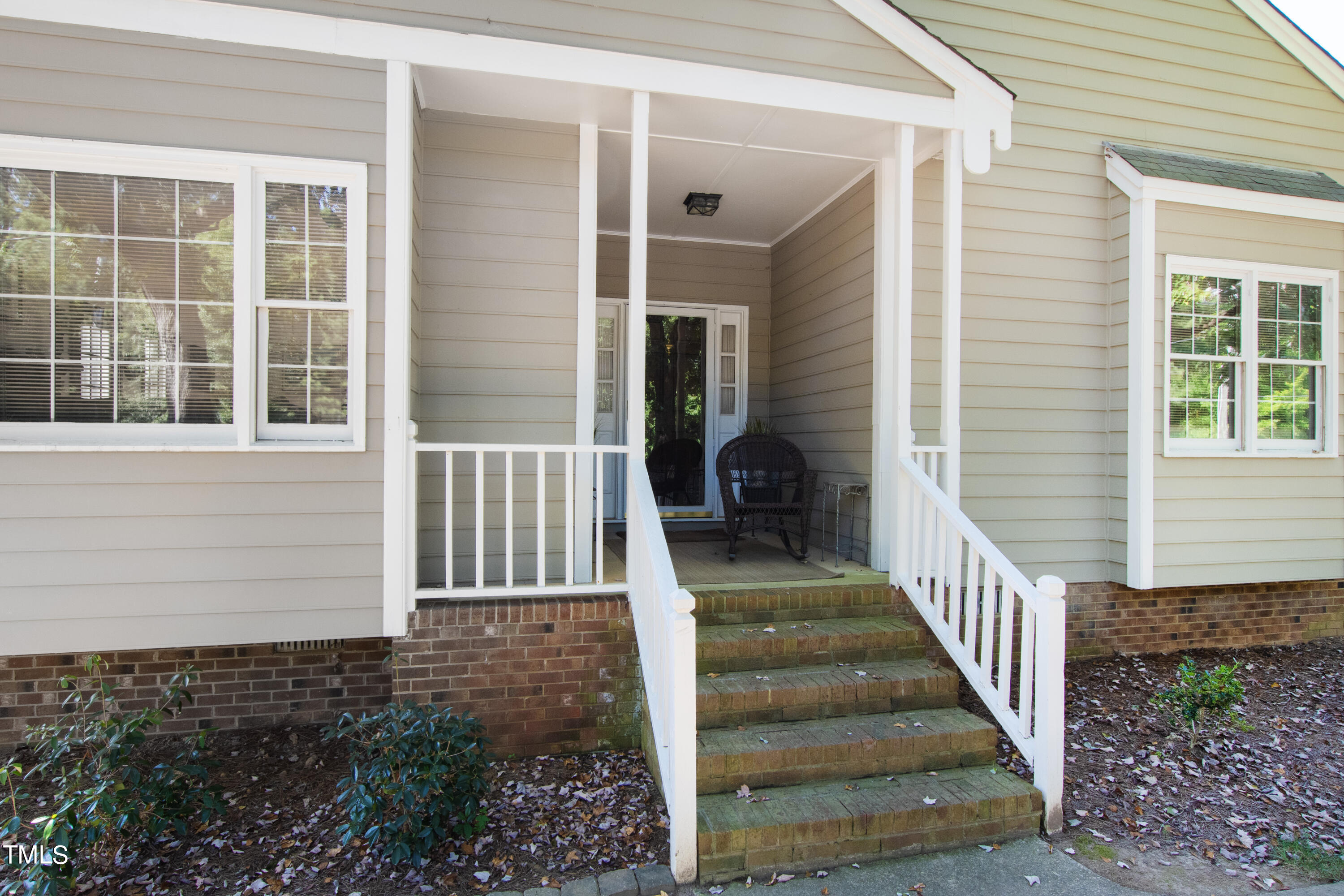 8450 Wycombe Lane Raleigh, NC 27615 - Photo 2 of 32 a view of a house with deck and backyard