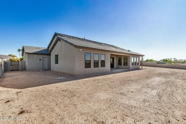 a view of a road with a building in the background