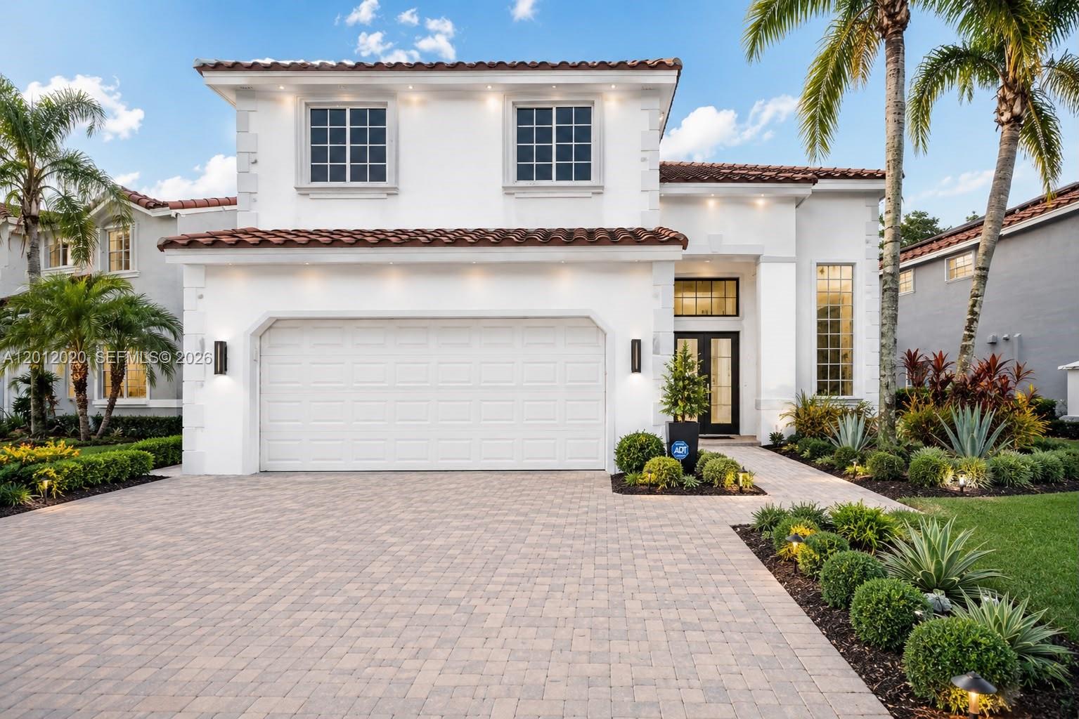 303 Bridgeton Road Weston, FL 33326 - Photo 2 of 52