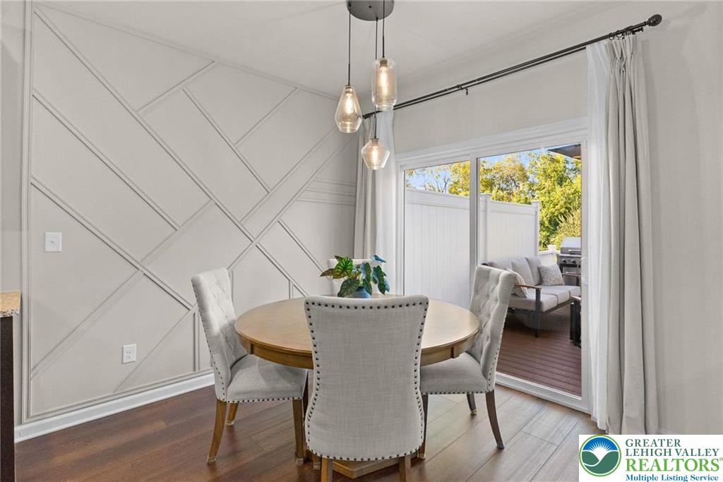 312 Redclover Lane Allentown, PA 18104 - Photo 14 of 60 a view of a dining room with furniture window and wooden floor