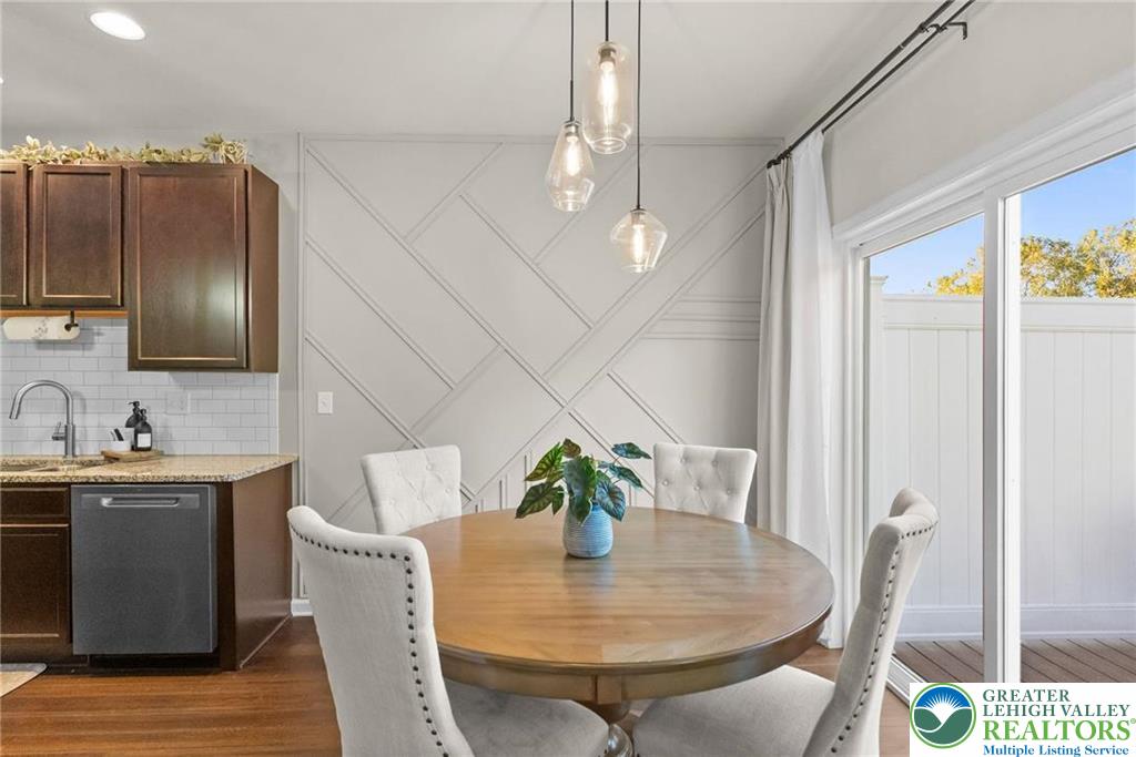 312 Redclover Lane Allentown, PA 18104 - Photo 15 of 60 a view of a dining room with furniture and wooden floor