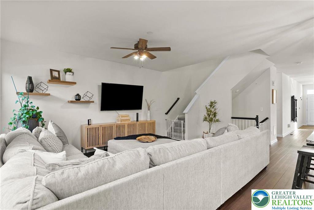 312 Redclover Lane Allentown, PA 18104 - Photo 19 of 60 a living room with furniture and a flat screen tv