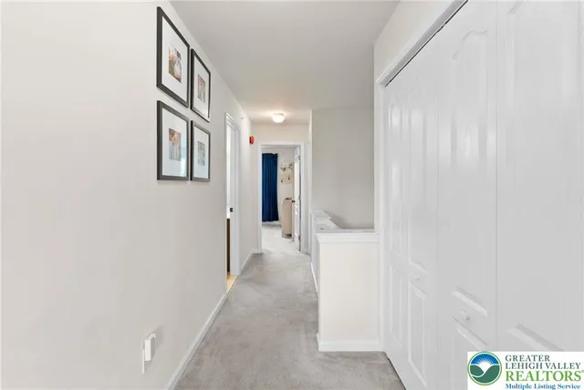 a bedroom with furniture and baby crib