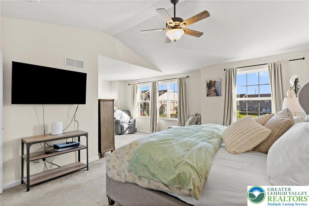 312 Redclover Lane Allentown, PA 18104 - Photo 31 of 60 a bedroom with a bed and a flat screen tv