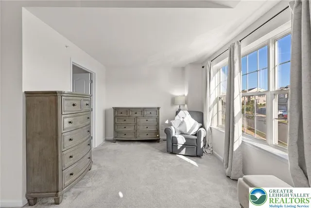 a bathroom with a tub and shower