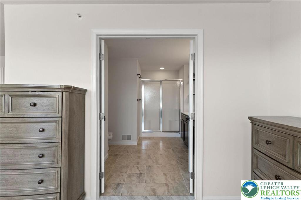 312 Redclover Lane Allentown, PA 18104 - Photo 36 of 60 a view of a closet area with mirror