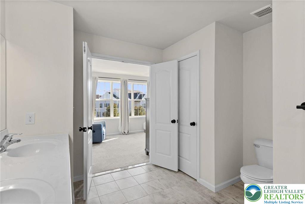 312 Redclover Lane Allentown, PA 18104 - Photo 40 of 60 a bathroom with a tub and shower