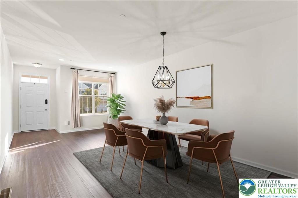 312 Redclover Lane Allentown, PA 18104 - Photo 4 of 60 a view of a dining room with furniture window and wooden floor
