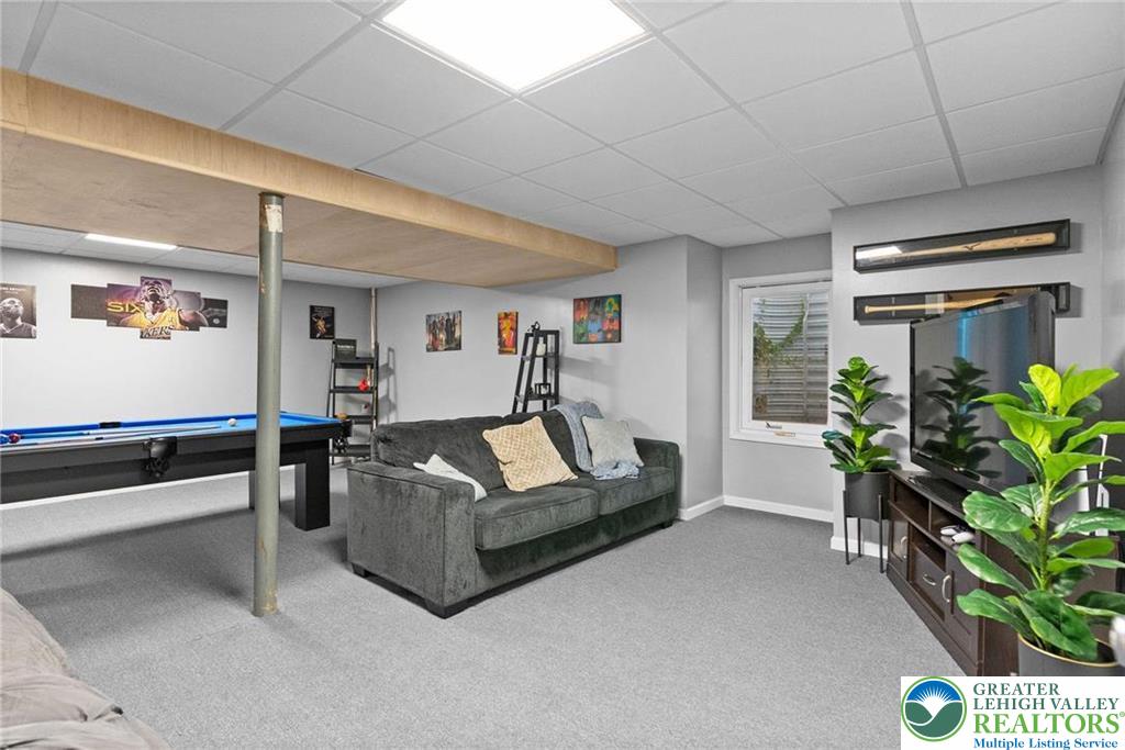 312 Redclover Lane Allentown, PA 18104 - Photo 43 of 60 a living room with furniture flowerpot and a potted plant