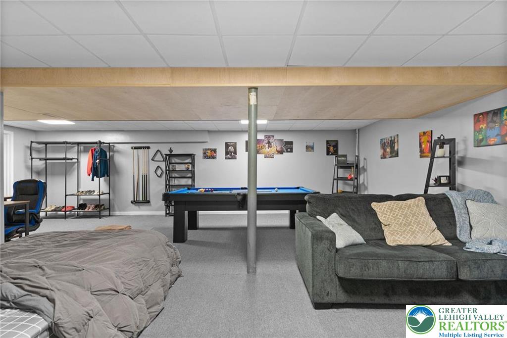 312 Redclover Lane Allentown, PA 18104 - Photo 44 of 60 a living room with furniture and a table