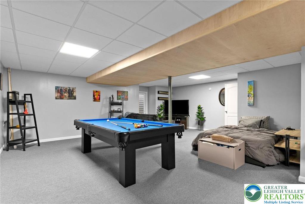 312 Redclover Lane Allentown, PA 18104 - Photo 45 of 60 a living room with furniture and a flat screen tv