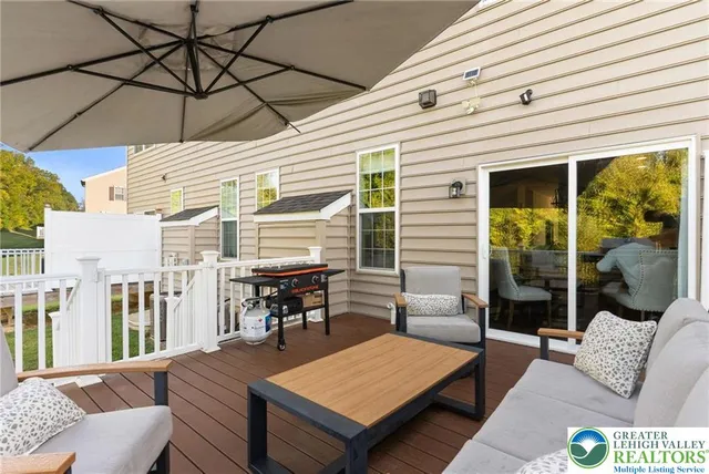 a picture of a bench in front of a wall