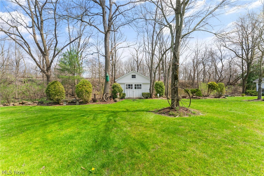 1815 Wick Campbell Road Hubbard, OH 44425 - Photo 43 of 43 View of yard featuring an outdoor structure