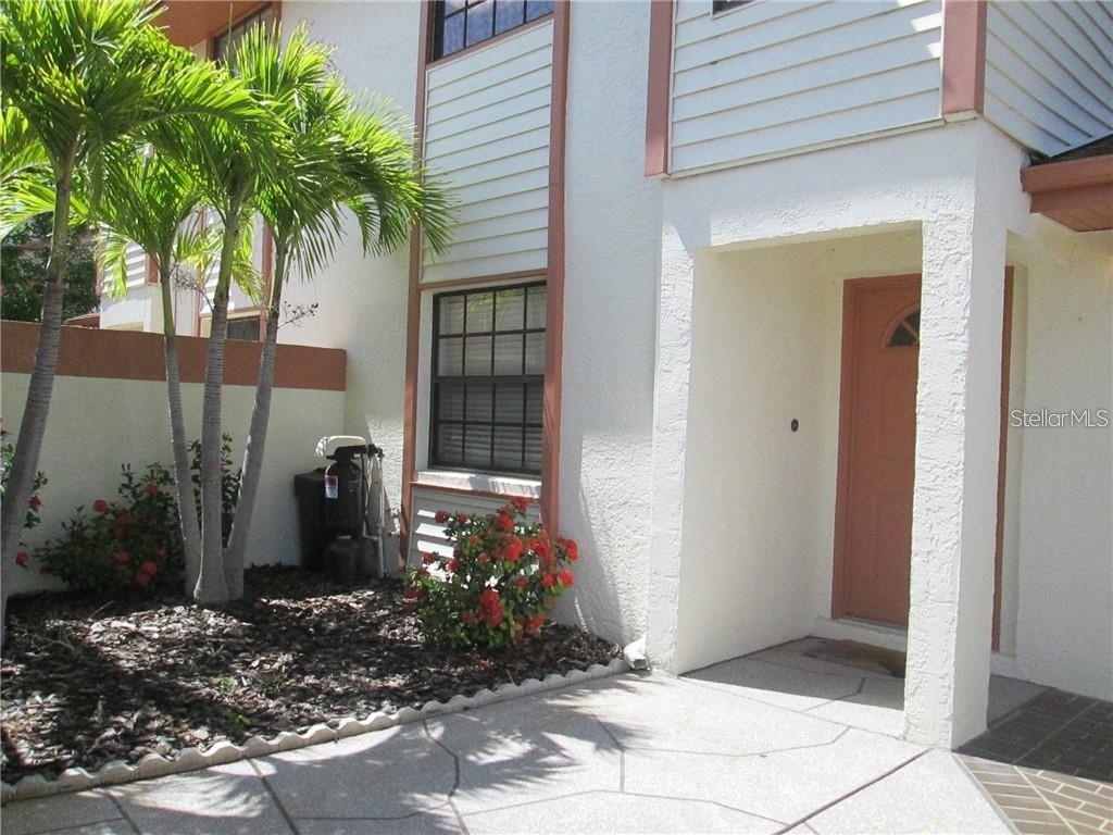 14873 Feather Cove Road Clearwater, FL 33762 - Photo 25 of 25 a front view of a house