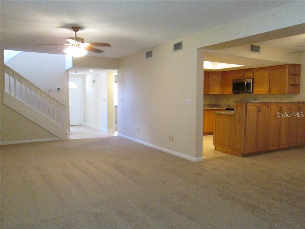 14873 Feather Cove Road Clearwater, FL 33762 - Photo 5 of 25 a view of a kitchen with a sink and cabinet area