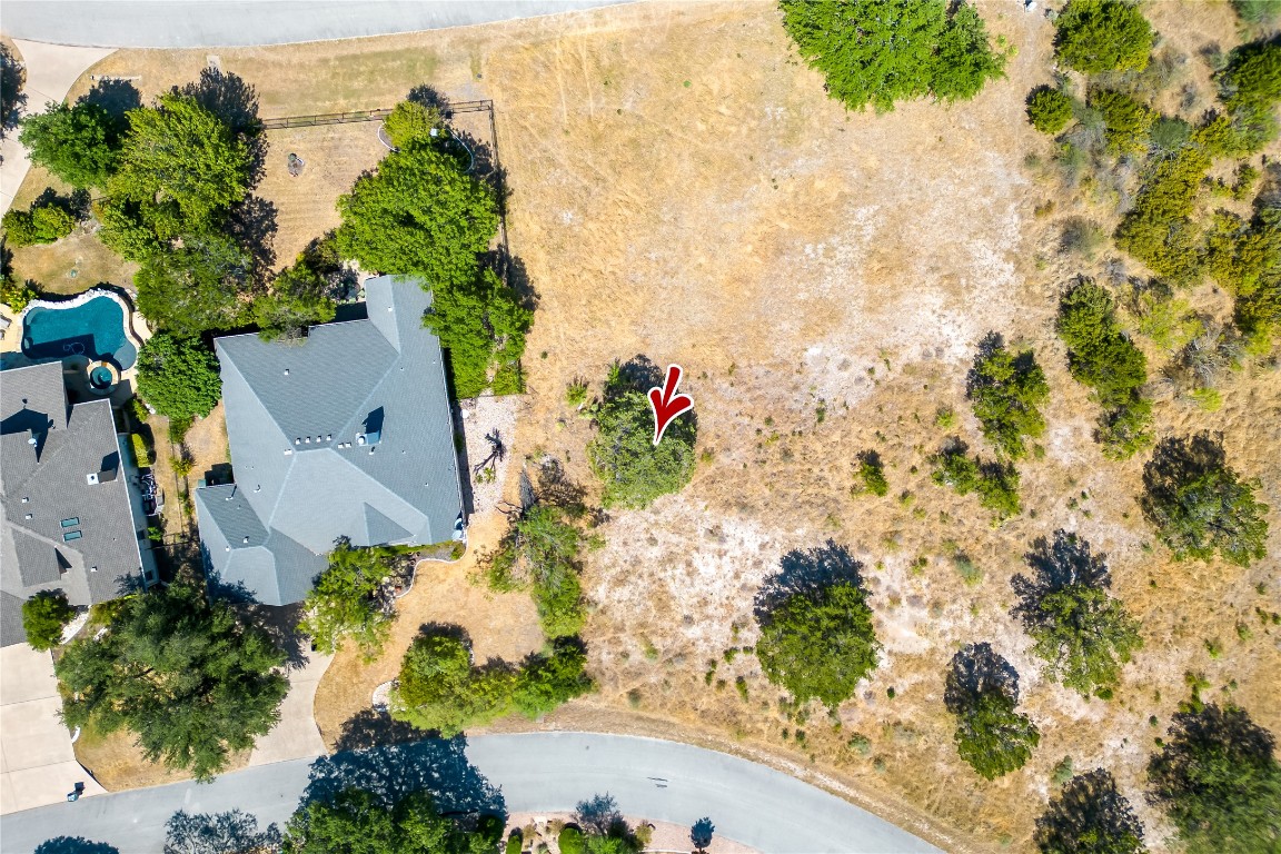 743 Wesley Ridge Drive Spicewood, TX 78669 - Photo 4 of 4 an aerial view of a house with a yard