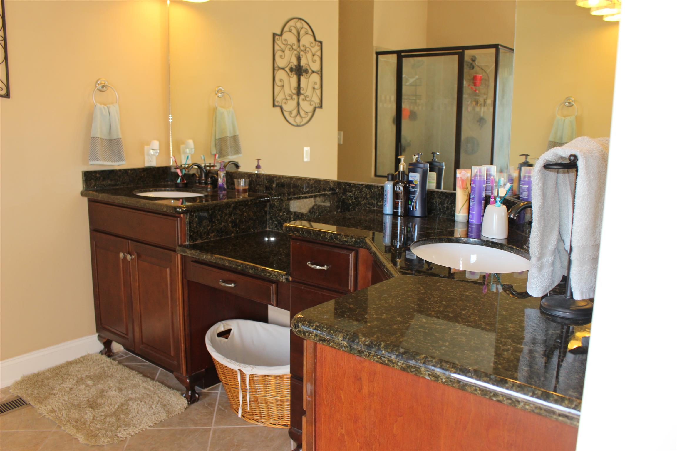 116 New Dawn Road Rockvale, TN 37153 - Photo 14 of 26 a bathroom with a granite countertop sink and a mirror