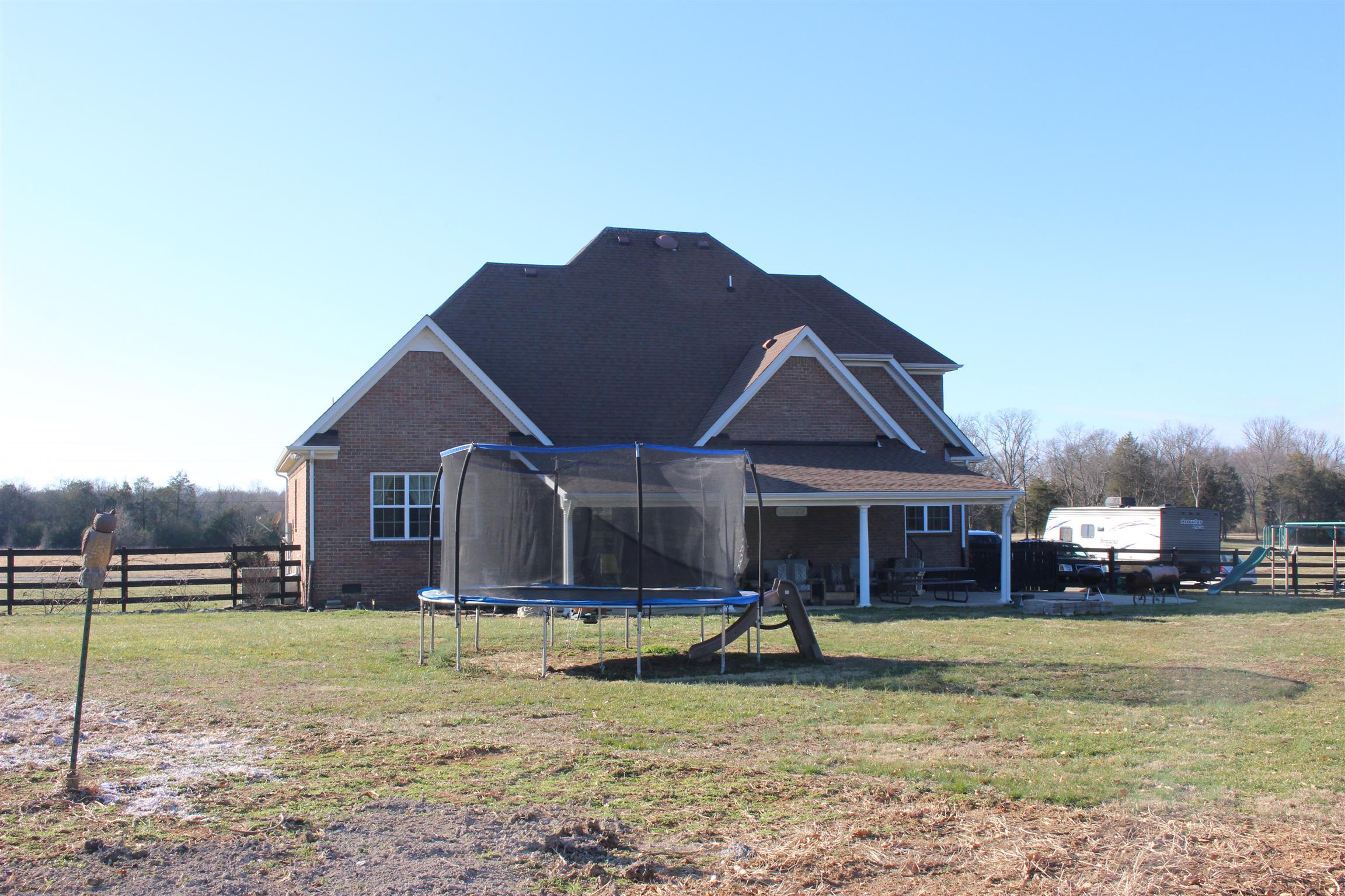 116 New Dawn Road Rockvale, TN 37153 - Photo 25 of 26 a front view of a house with a yard