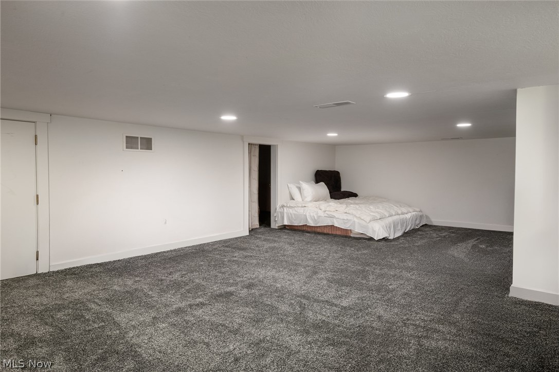 9419 Robinson Road Chardon, OH 44024 - Photo 36 of 46 Bedroom featuring dark colored carpet and recessed lighting