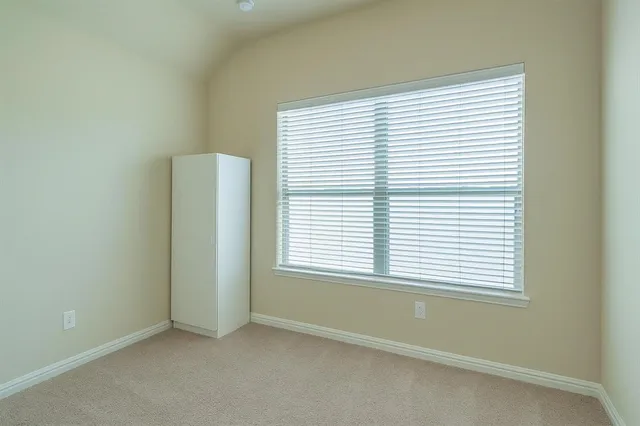 a view of a hallway with workspace
