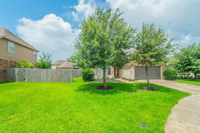 a view of a backyard with a garden