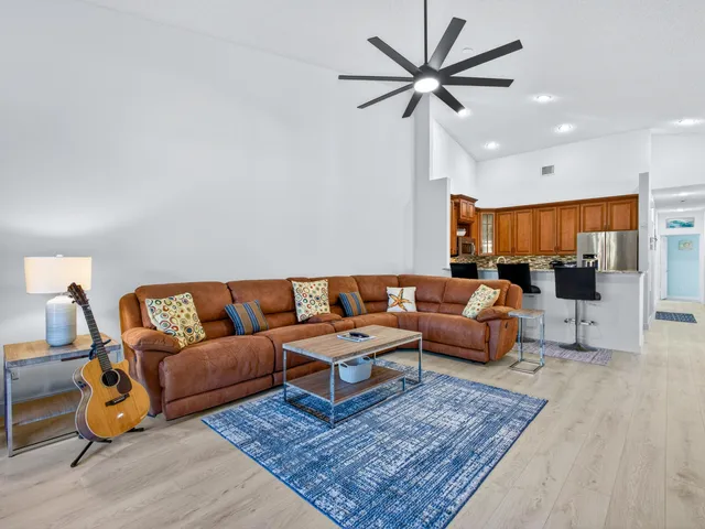 a living room with furniture and a rug