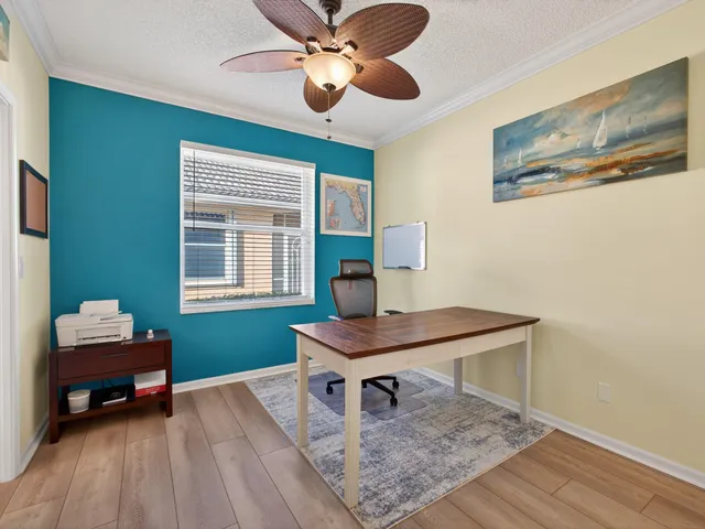 a workspace with furniture and a window