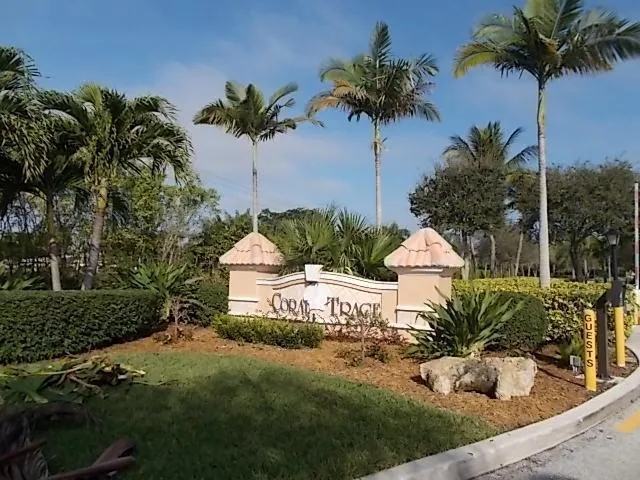 a room with pool table and windows