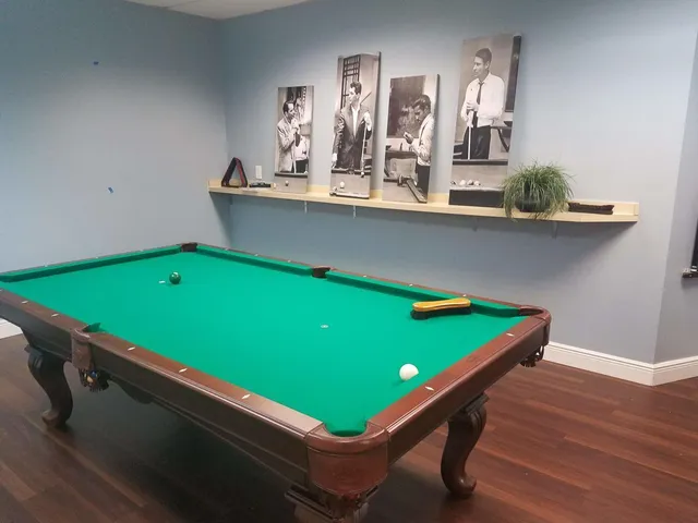 a view of swimming pool with outdoor seating and lake view